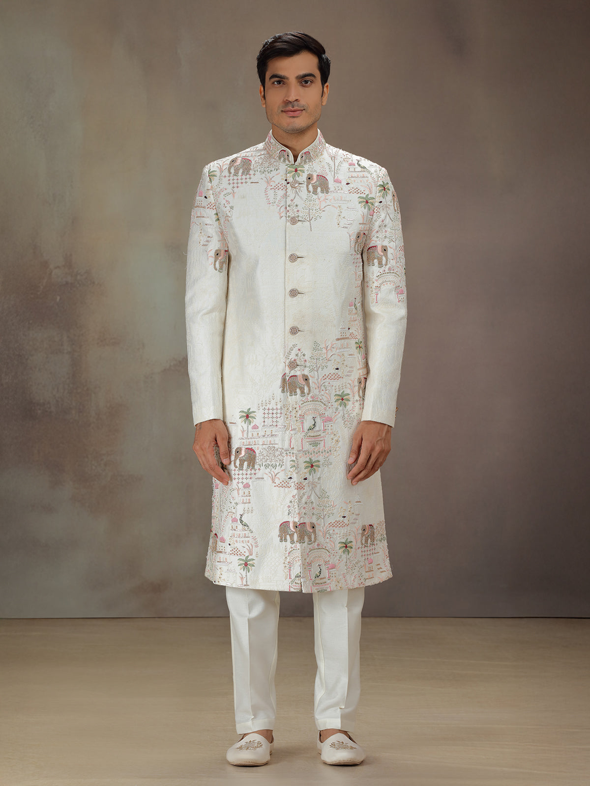 White silk elephant motif set