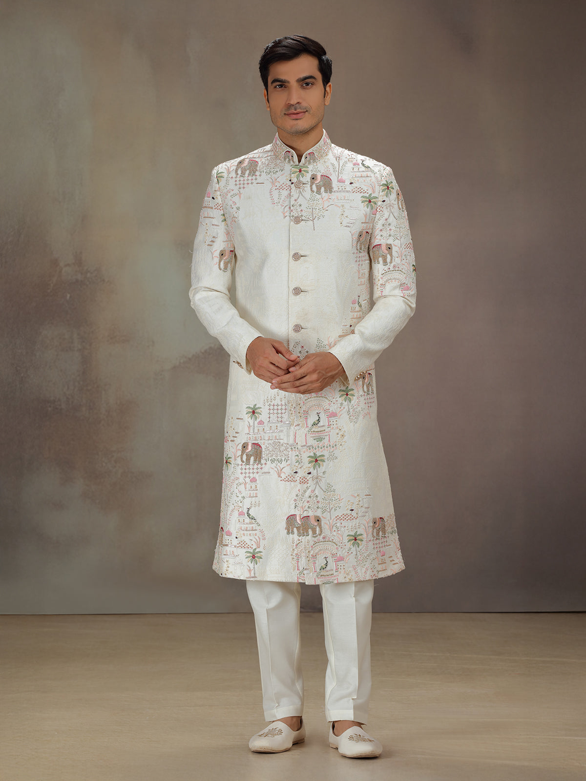 White silk elephant motif set