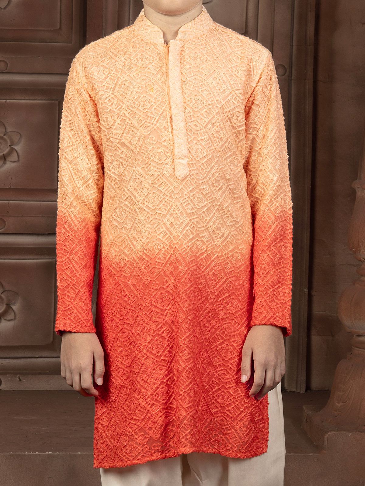 Yellow and orange silk kurta set with thread artistry