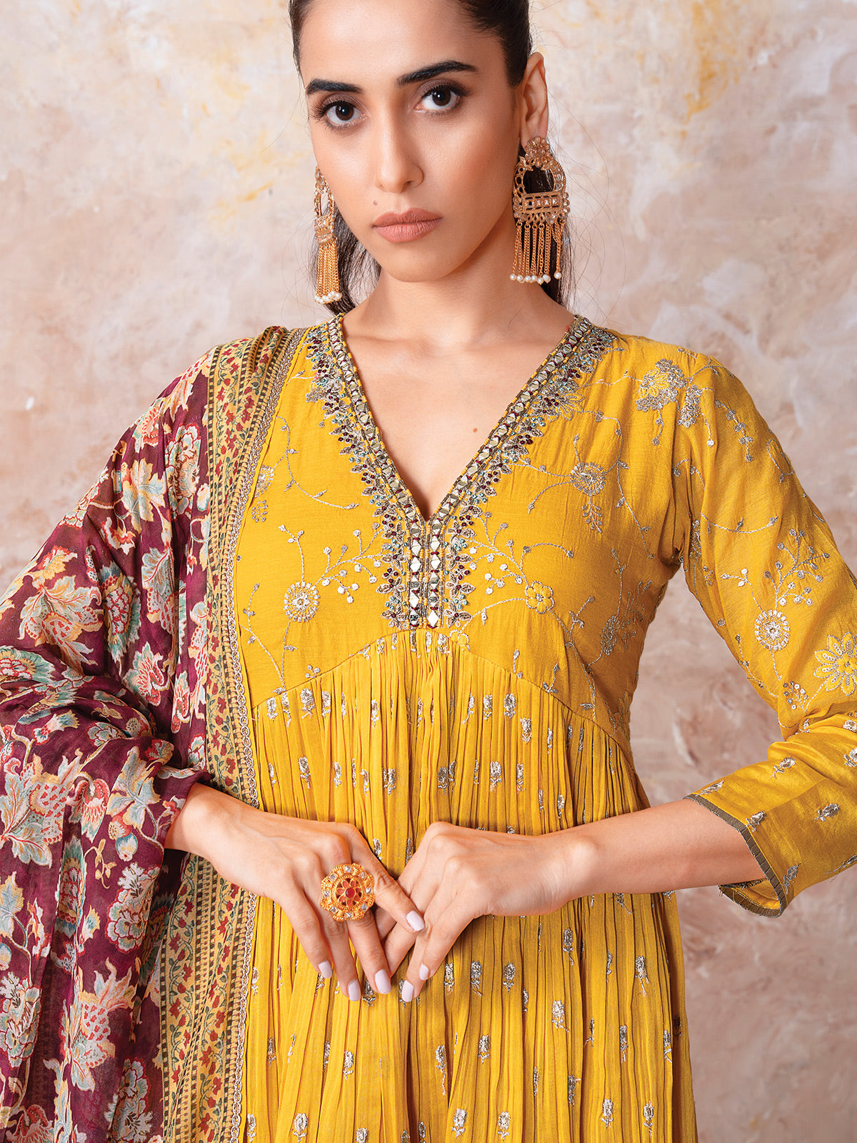 Yellow designer suit for festive celebration