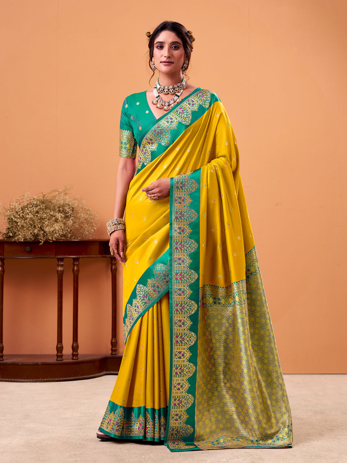 Yellow satin silk saree with zari motifs