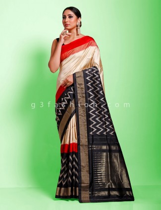 Cream and black contrast zigzag hydrabadi ikkat patola sari