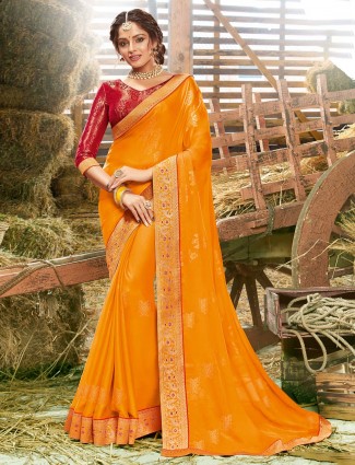 Festive wear orange georette saree