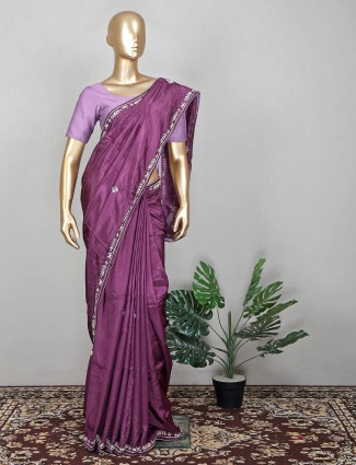 Lavish silk sari for wedding functions in purple color