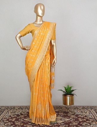 Magnificent bright yellow wedding look dola silk saree for women
