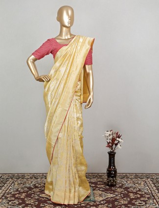 Magnificent pearl yellow wedding look raw silk saree