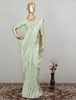 Outstanding mint green wedding look raw silk saree