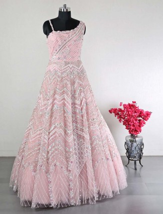 Peach net wedding wear gown for women