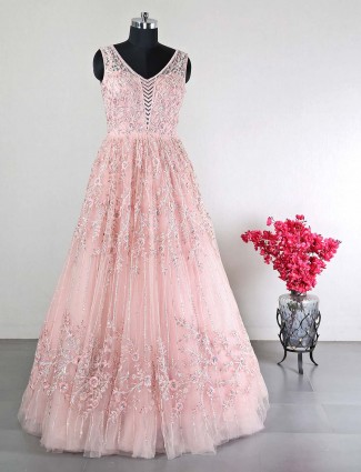 Peach reception wear net gown for women