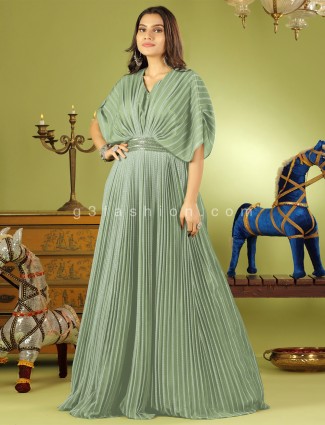 Pistachio green attractive georgette gown for reception season