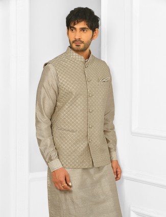 Thread decorated festive wear waistcoat suit in chickoo tint