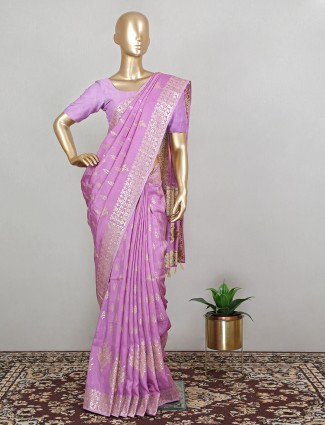 Trendy blush pink dola silk saree for wedding seasons