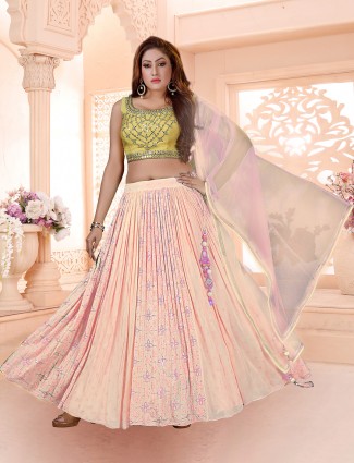 Trendy peach designer wedding wear lehenga choli for women