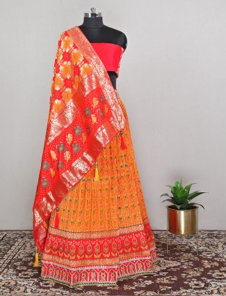 Wedding orange designer unstitched lehenga choli in patola silk