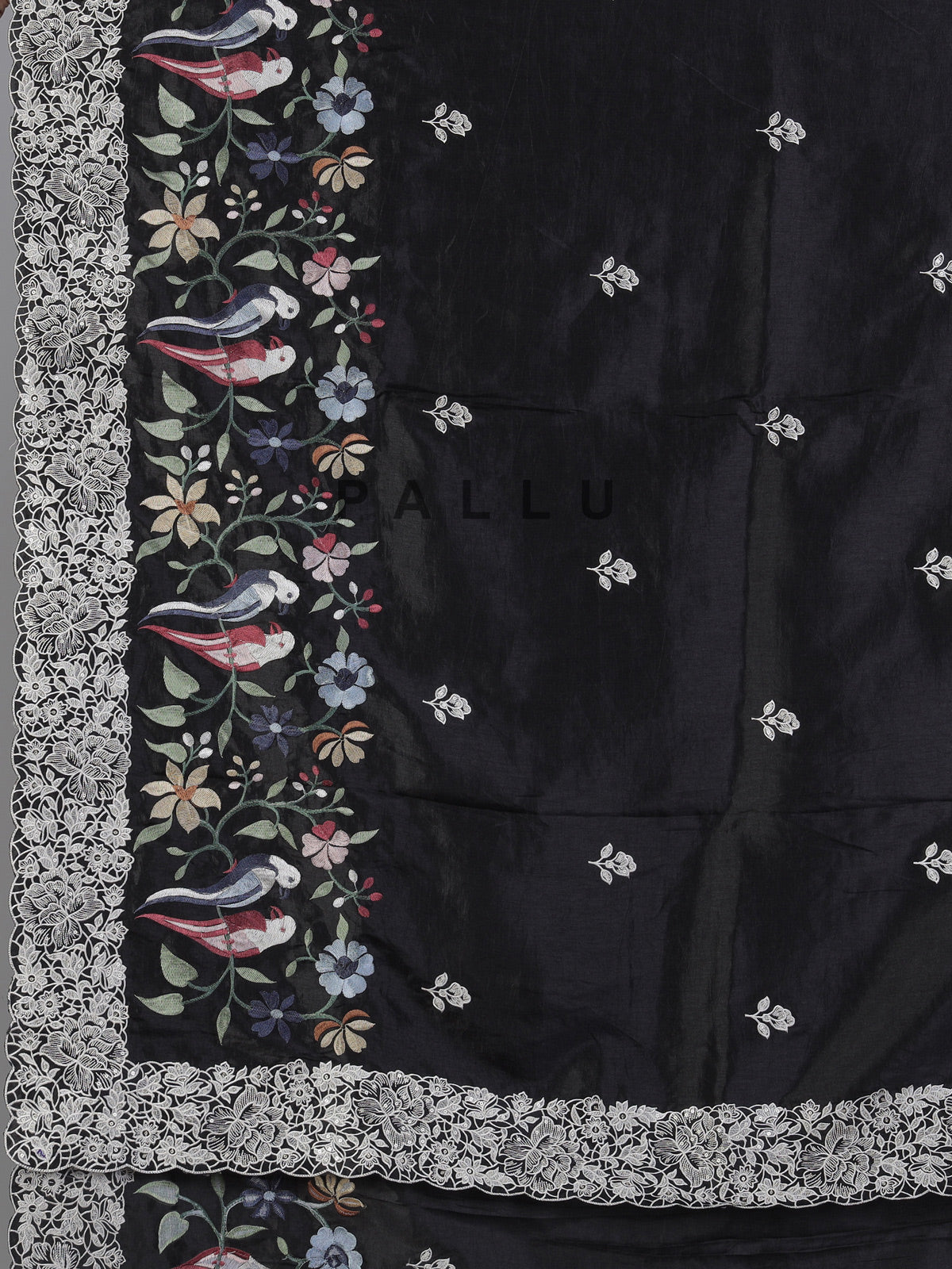 Black semi tusser silk saree with rich sequin work