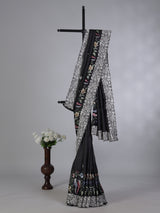 Black semi tusser silk saree with rich sequin work