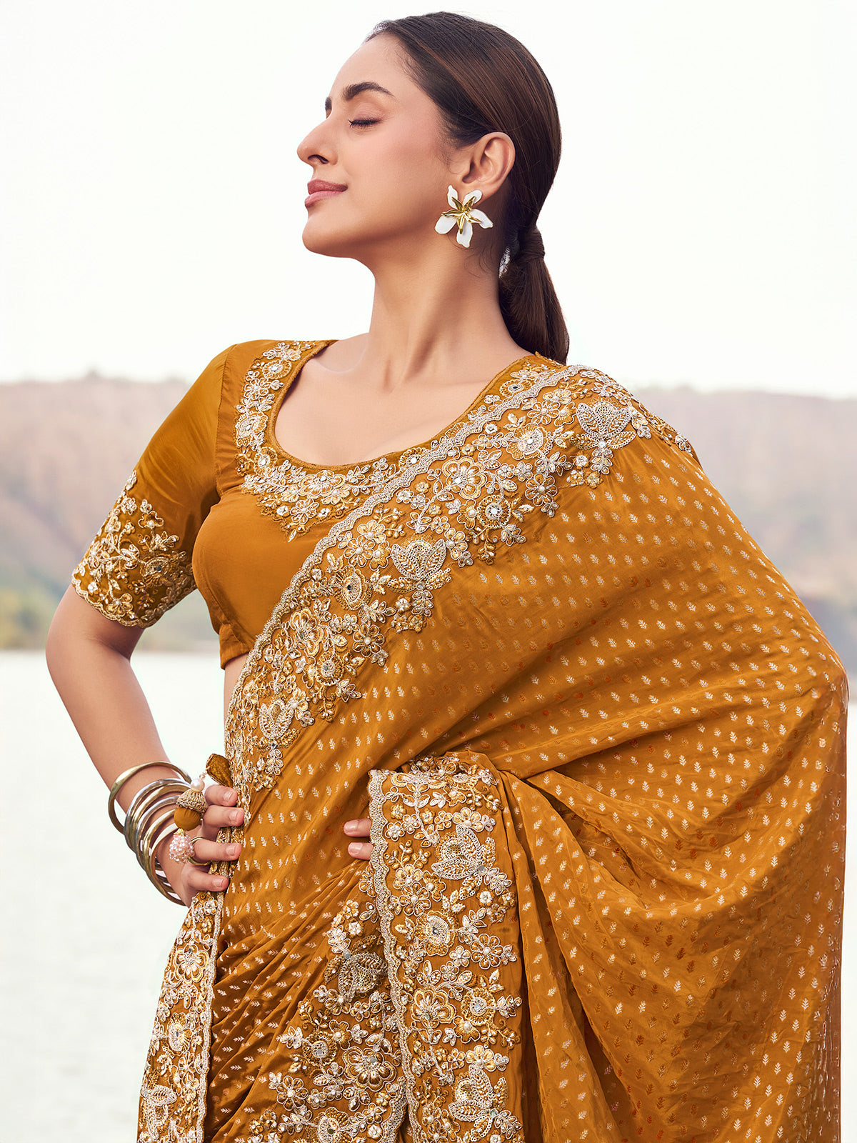 Mustard yellow satin silk saree for wedding wear