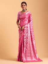 Pink silk saree enhanced with elegant zari detailing