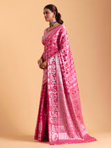 Pink silk saree enhanced with elegant zari detailing