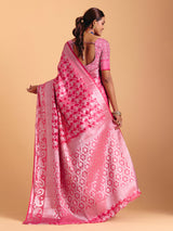 Pink silk saree enhanced with elegant zari detailing