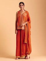 Orange tissue silk palazzo suit with zari glow