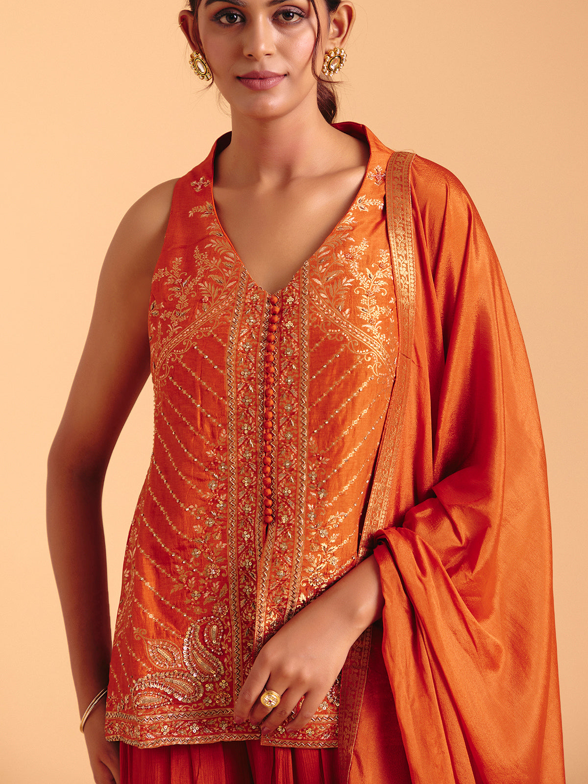 Orange tissue silk palazzo suit with zari glow