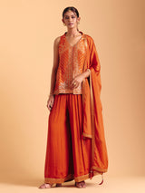 Orange tissue silk palazzo suit with zari glow
