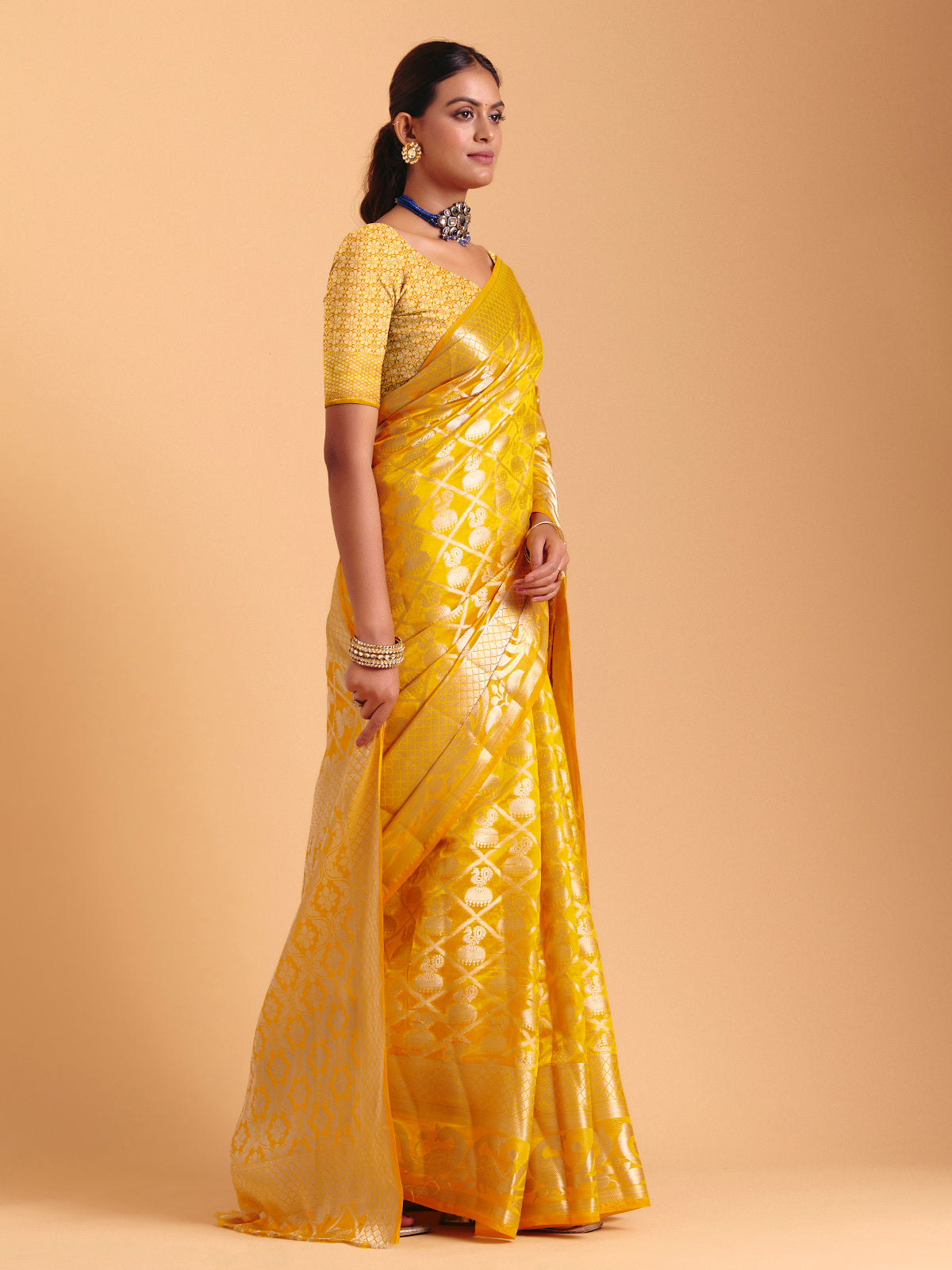 Mustard yellow silk saree with zari work
