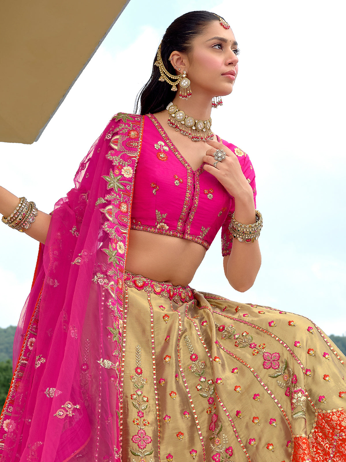 Magenta and gold wedding wear silk lehenga choli