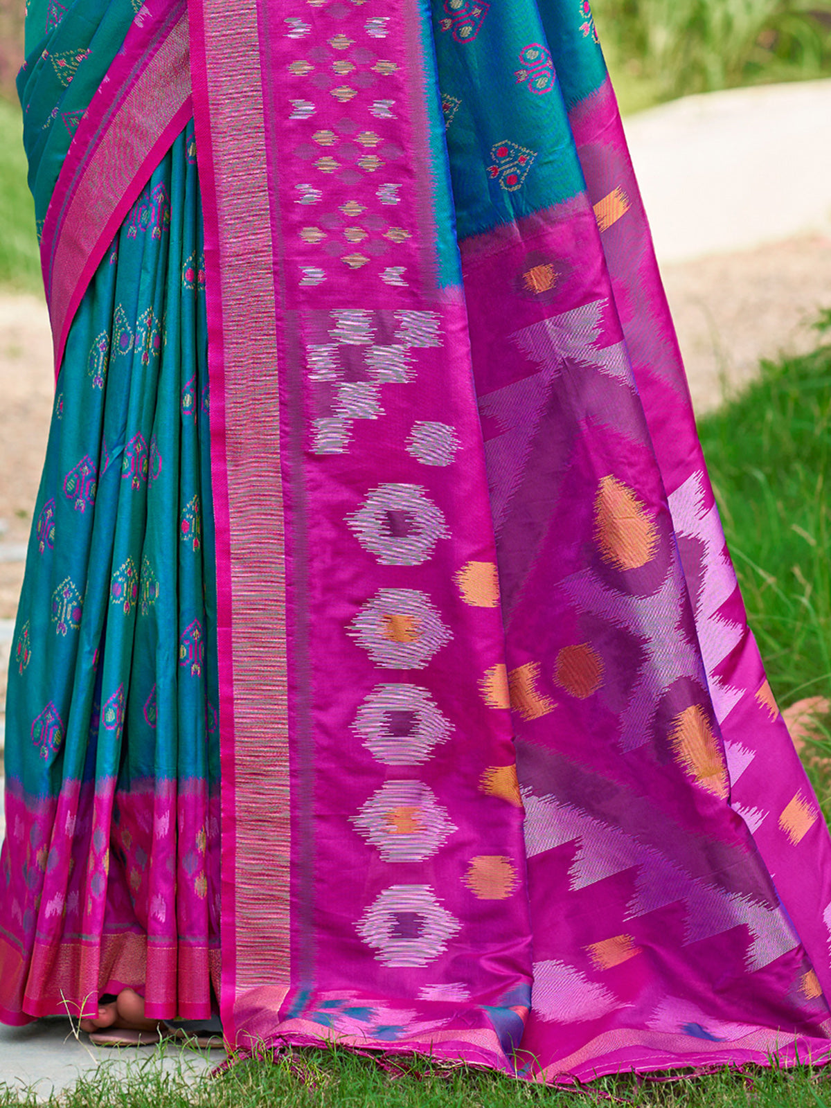 Rama blue silk printed saree with bold blouse and border