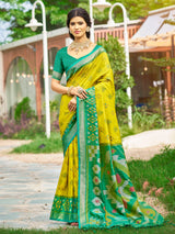 Yellow silk printed saree with contrast border and blouse