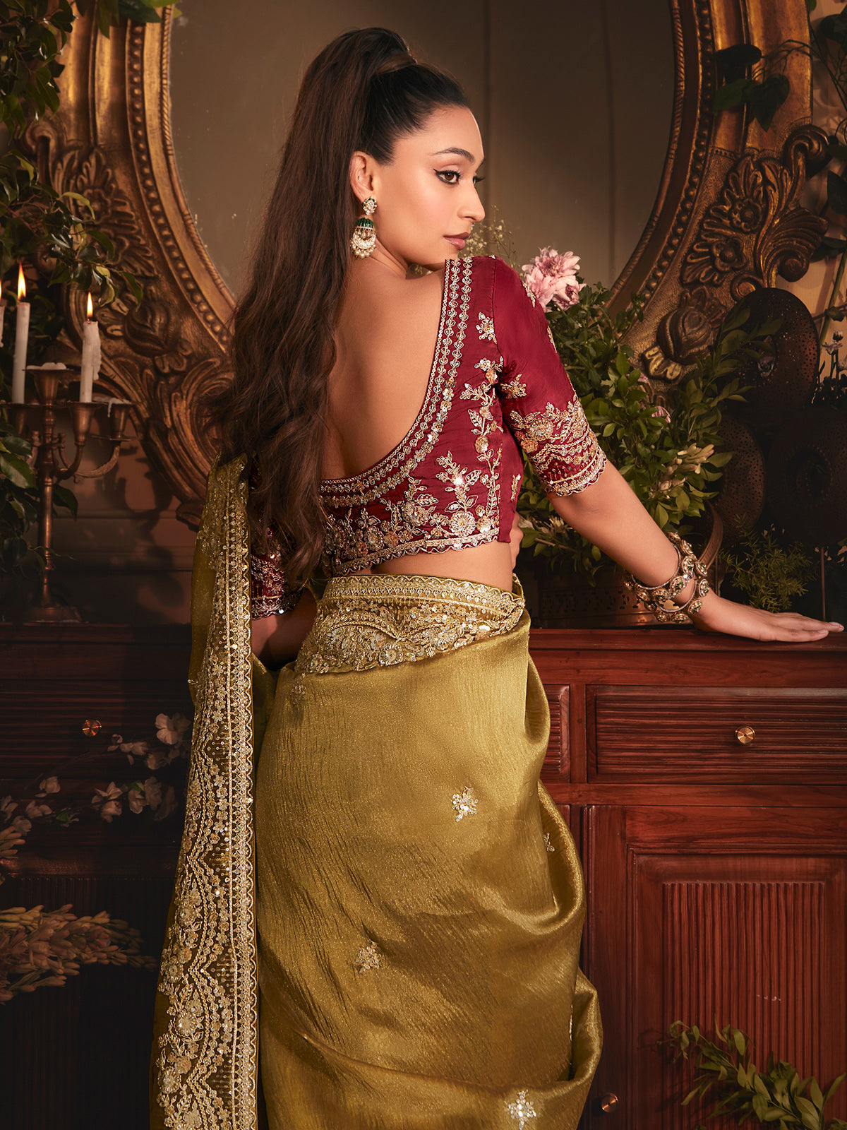 Mehendi green tissue organza saree with striking marron blouse