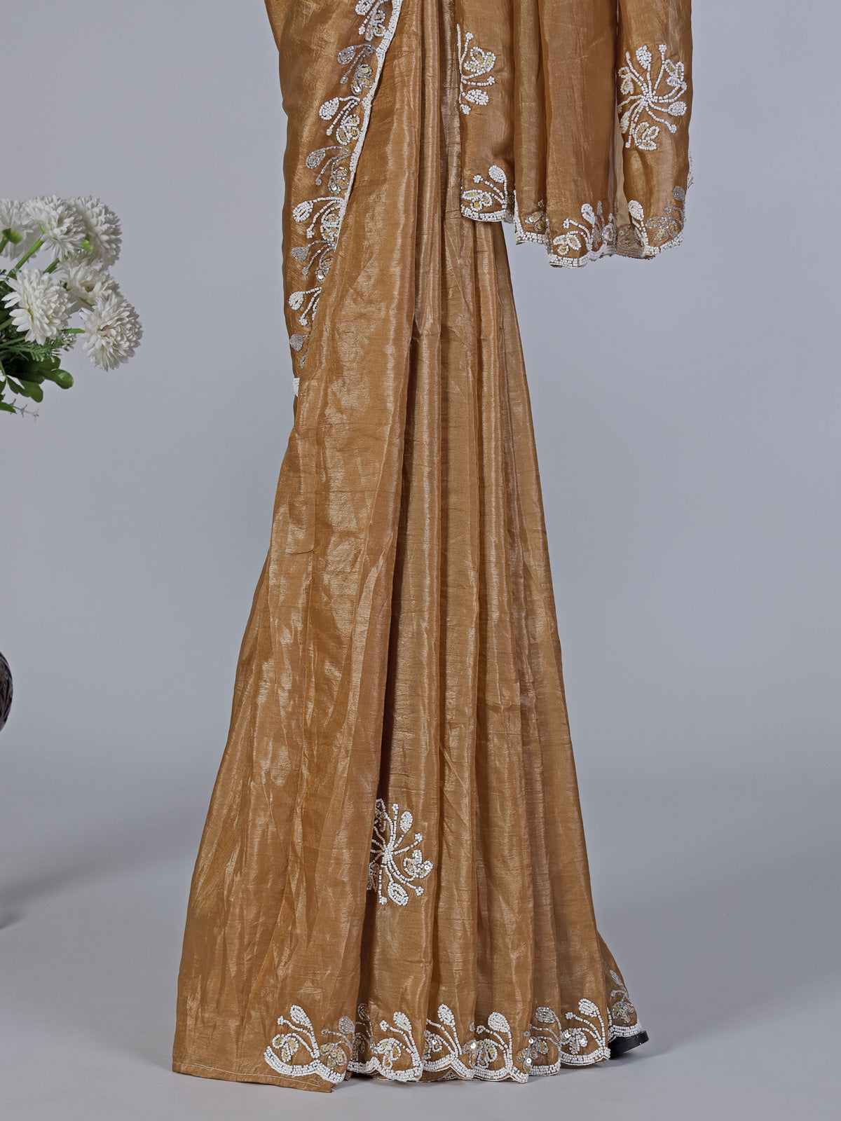 Dark beige cruss tissue silk saree with bead embellishments