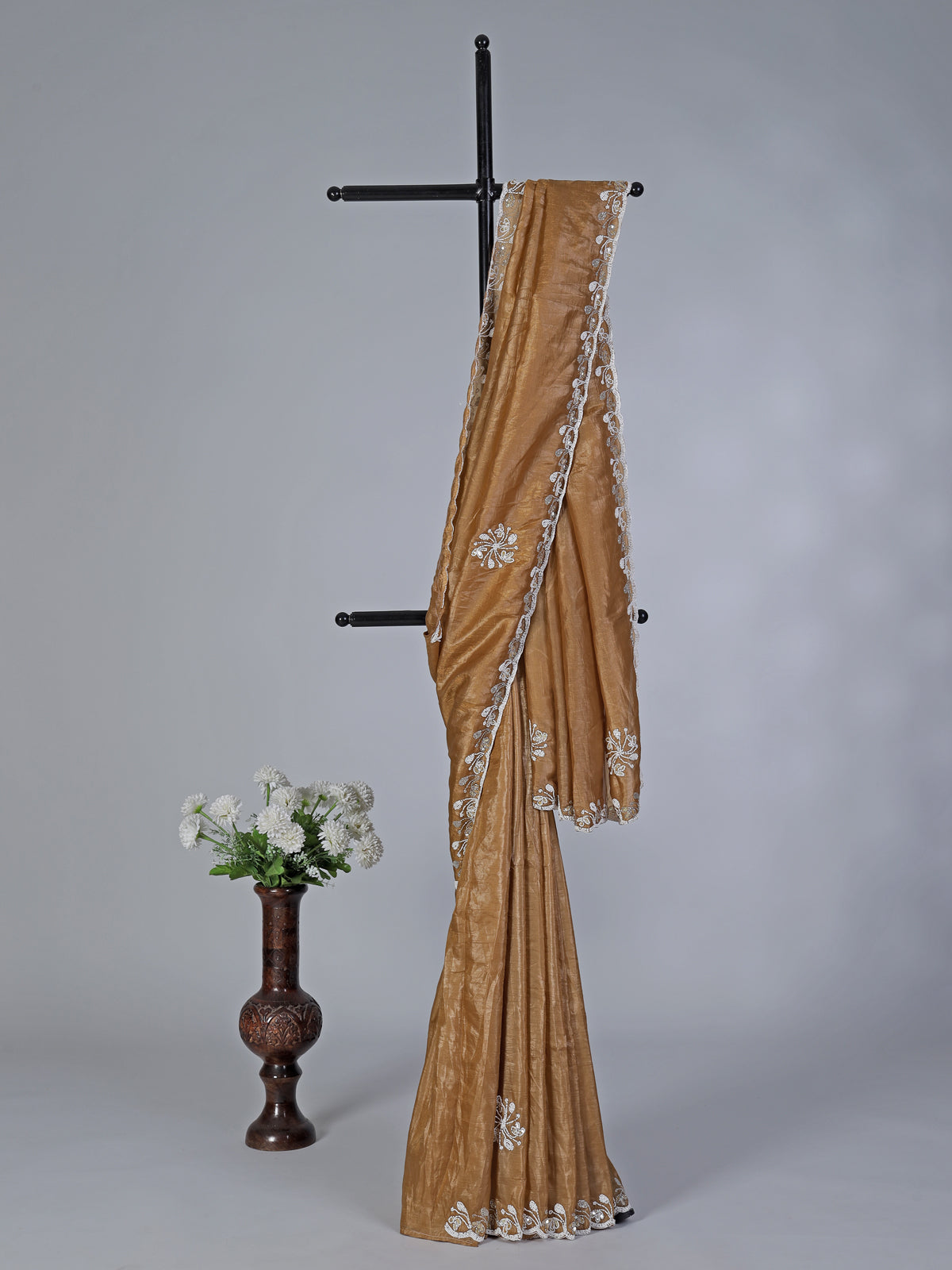Dark beige cruss tissue silk saree with bead embellishments