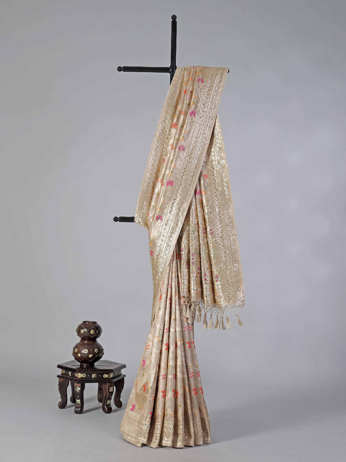 Cream minakari tissue silk saree with colorful motifs