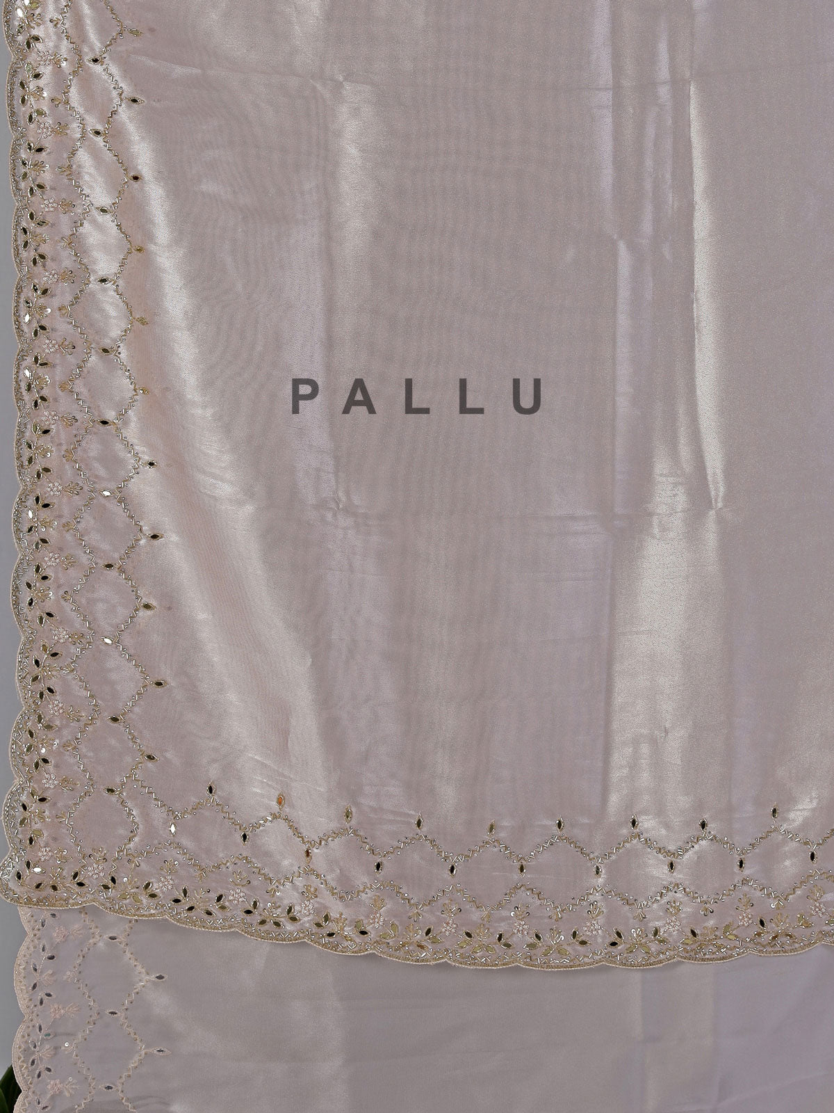 Peach tissue silk mirror worked saree