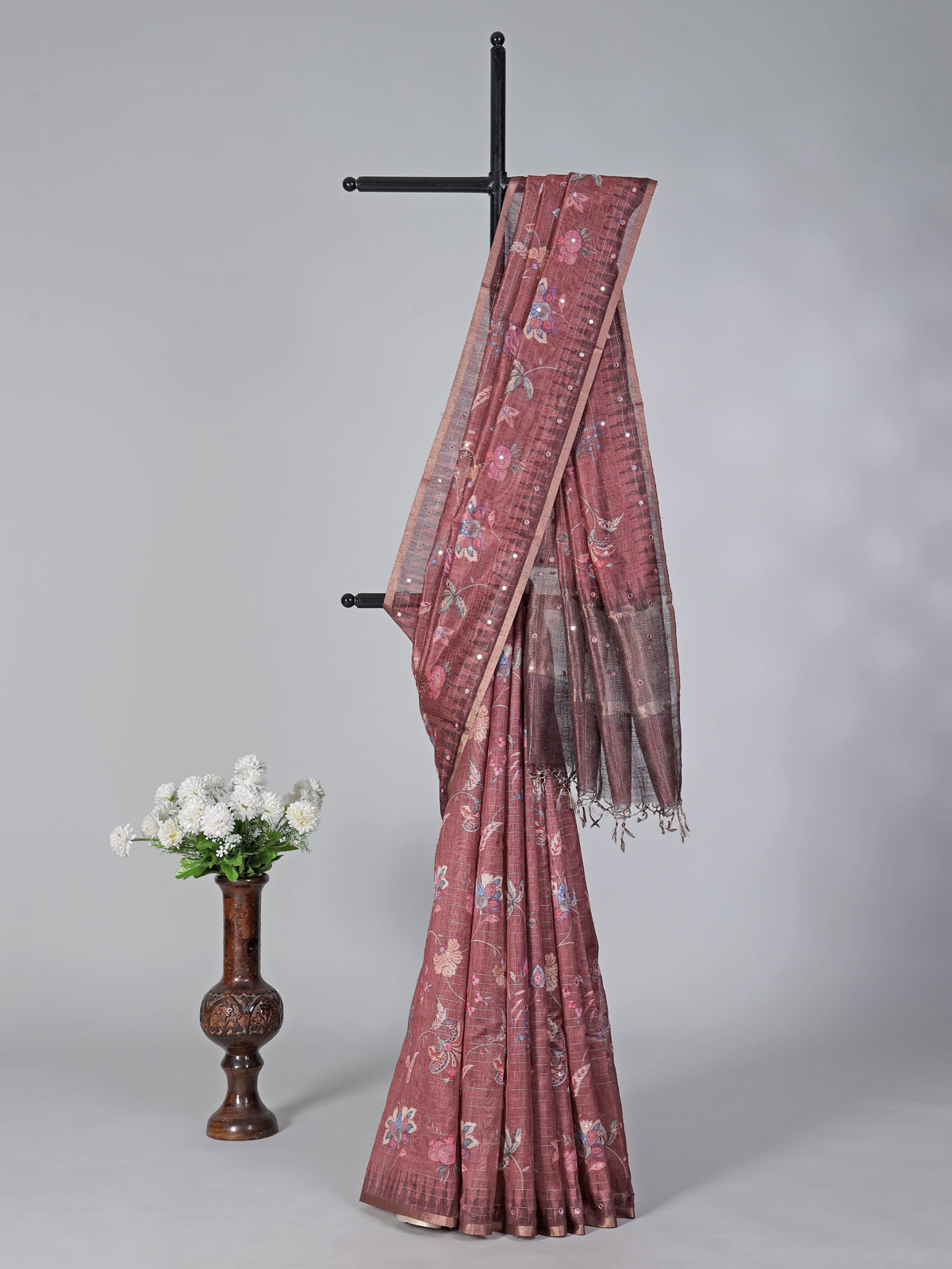 Brown floral printe and mirror work saree
