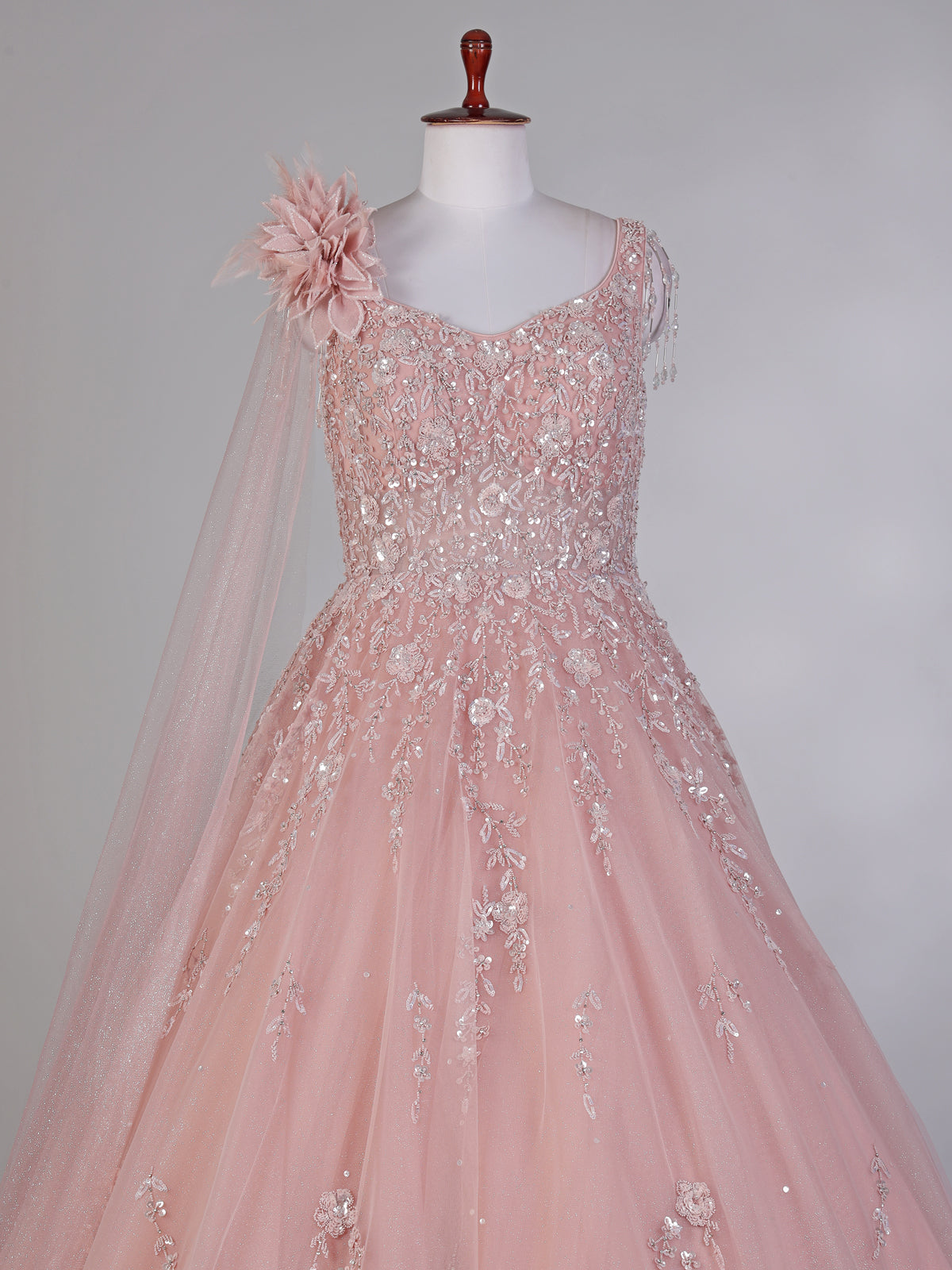 Pink net designer gown with sequins and beads work