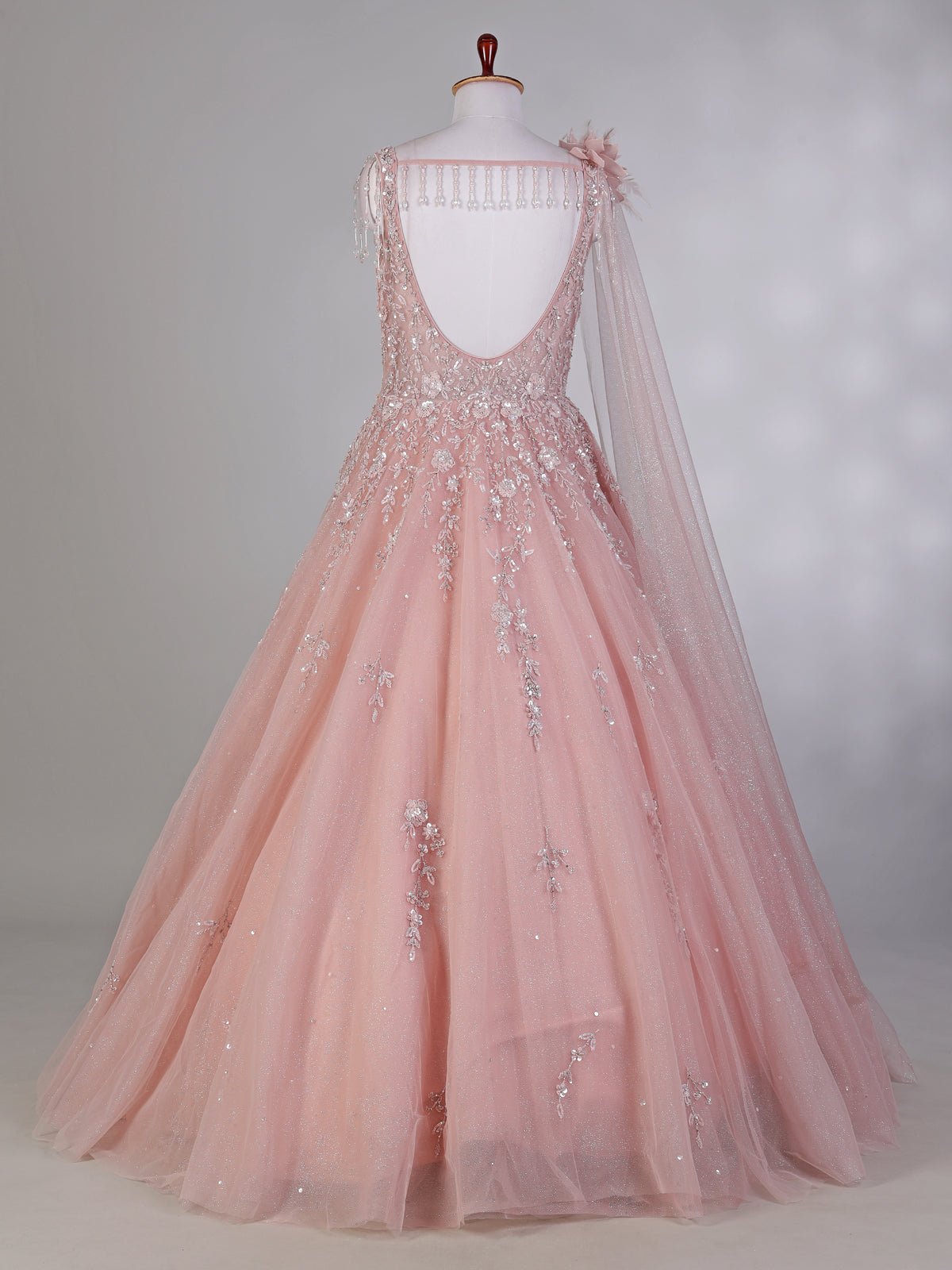 Pink net designer gown with sequins and beads work