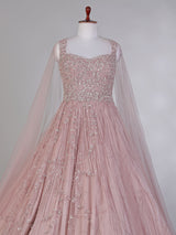 Onion pink net designer gown with diamond work