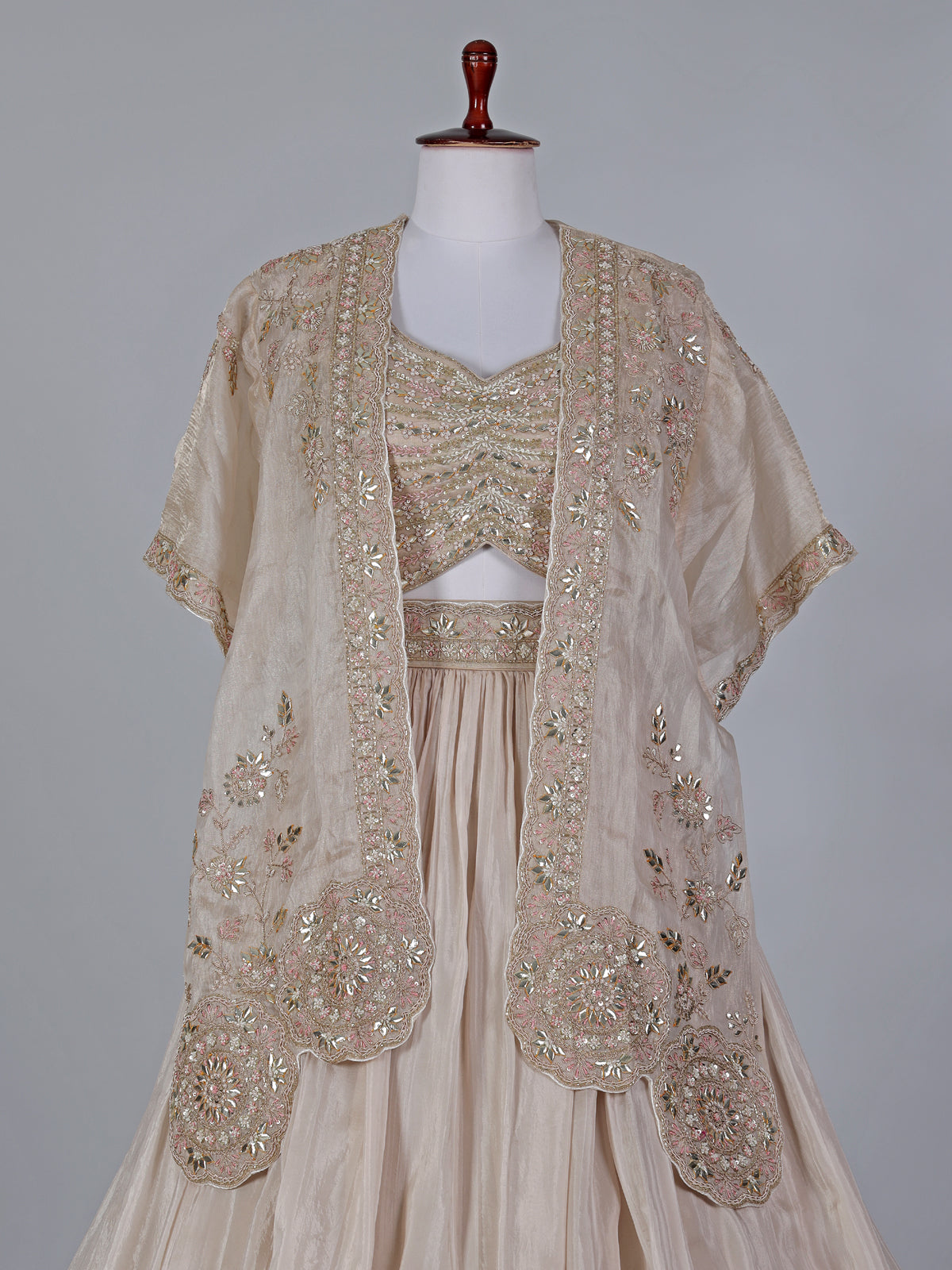 Beige reception wear lehenga choli in tissue silk