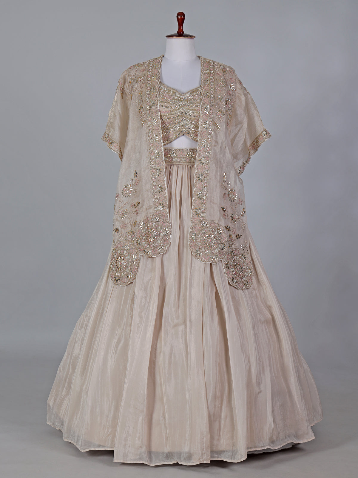 Beige reception wear lehenga choli in tissue silk
