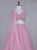Light pink net lehenga choli with mirror and stone work