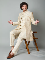 Beige silk embroidered indowestern set with brooch