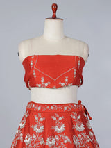 Rust orange raw silk embellished lehenga choli