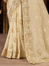 Beige soft silk mirror work and embroidered saree