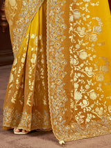 Mustard yellow soft silk embroidered festive wear saree