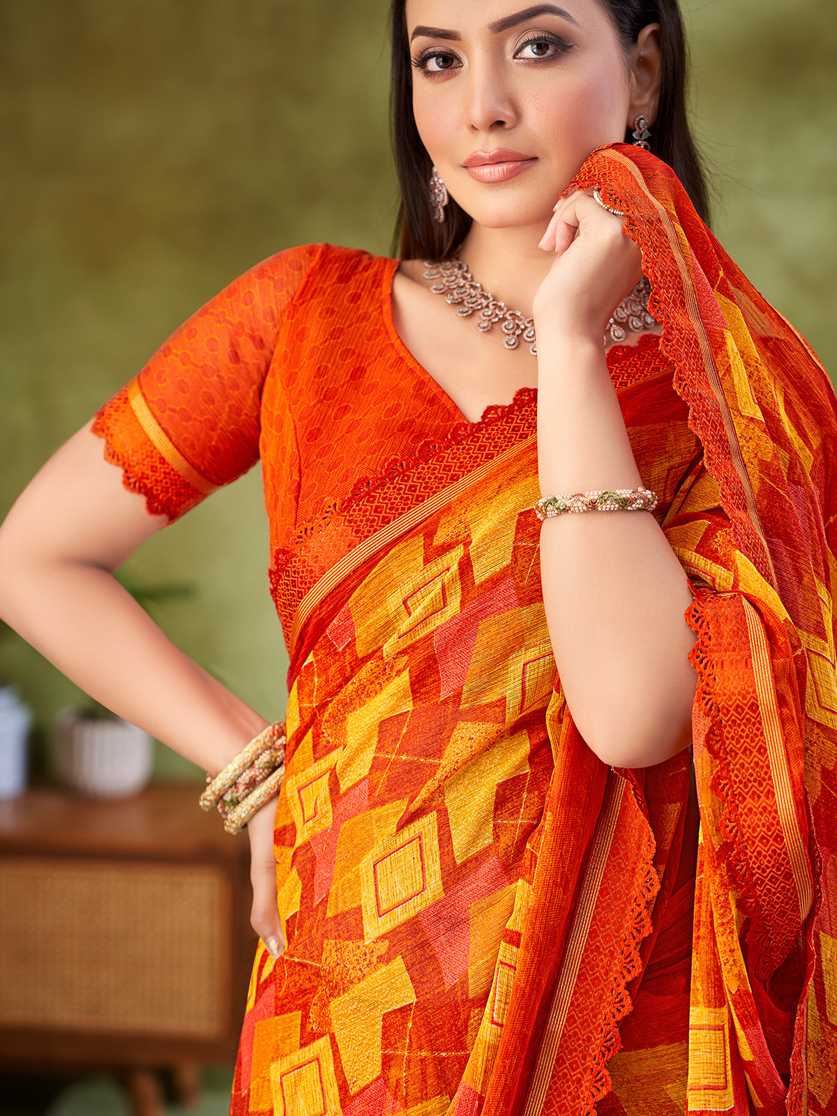 Orange geometric printed georgette saree