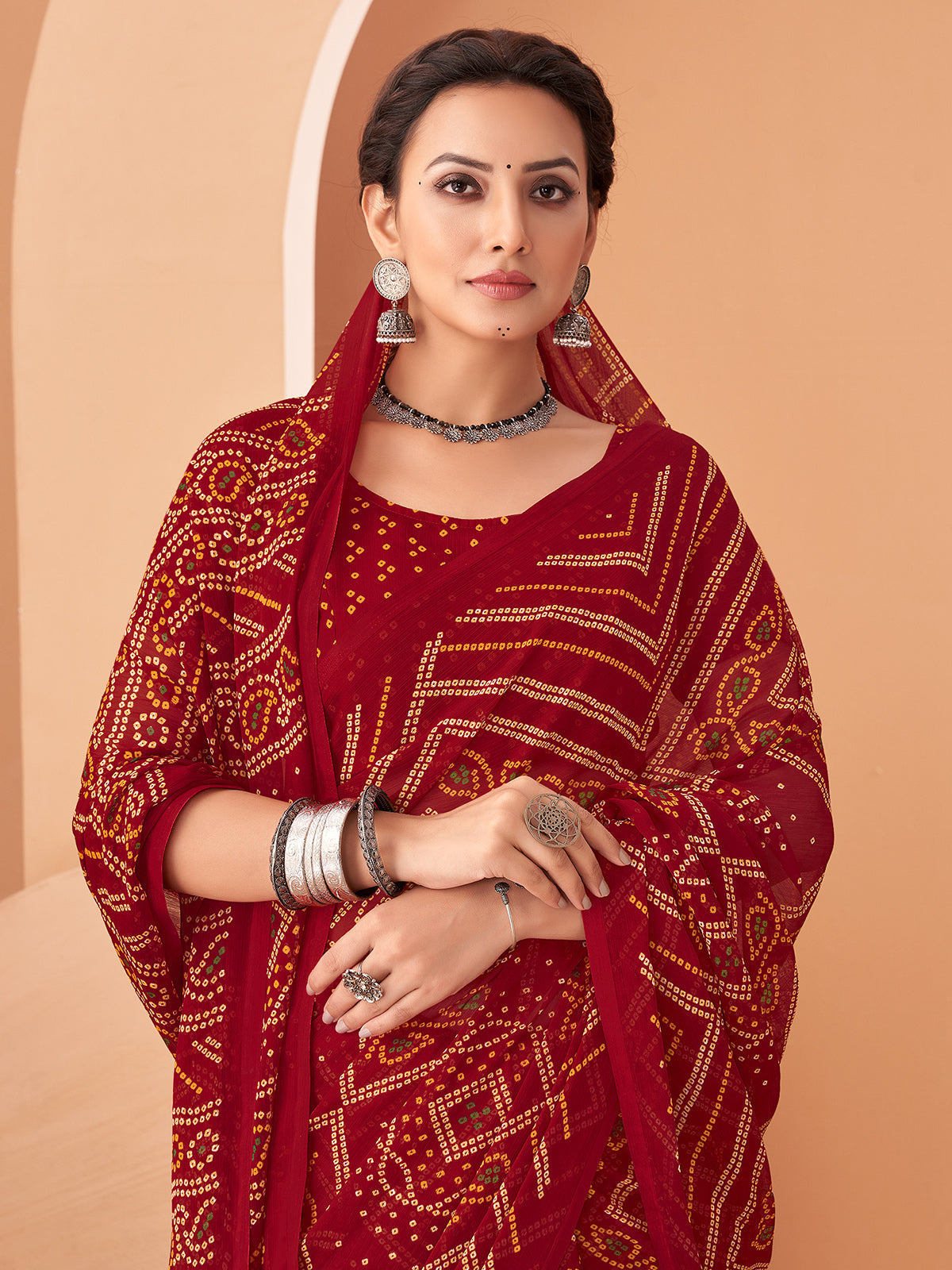 Maroon bandhani printed chiffon saree