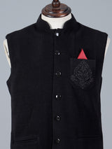 Black woolen waistcoat with zardosi work on pocket